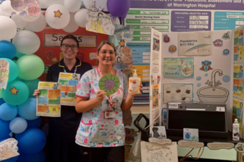 Staff with information stand.
