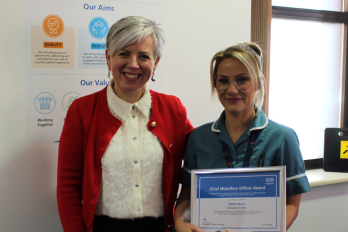1.	Kate Brintworth, Chief Midwifery Officer for England, presenting Rachel Wood, Maternity Support Worker, with the Chief Midwifery Officer Award.