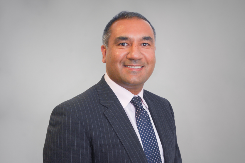 Headshot photo of Nikhil Khashu, Chief Executive