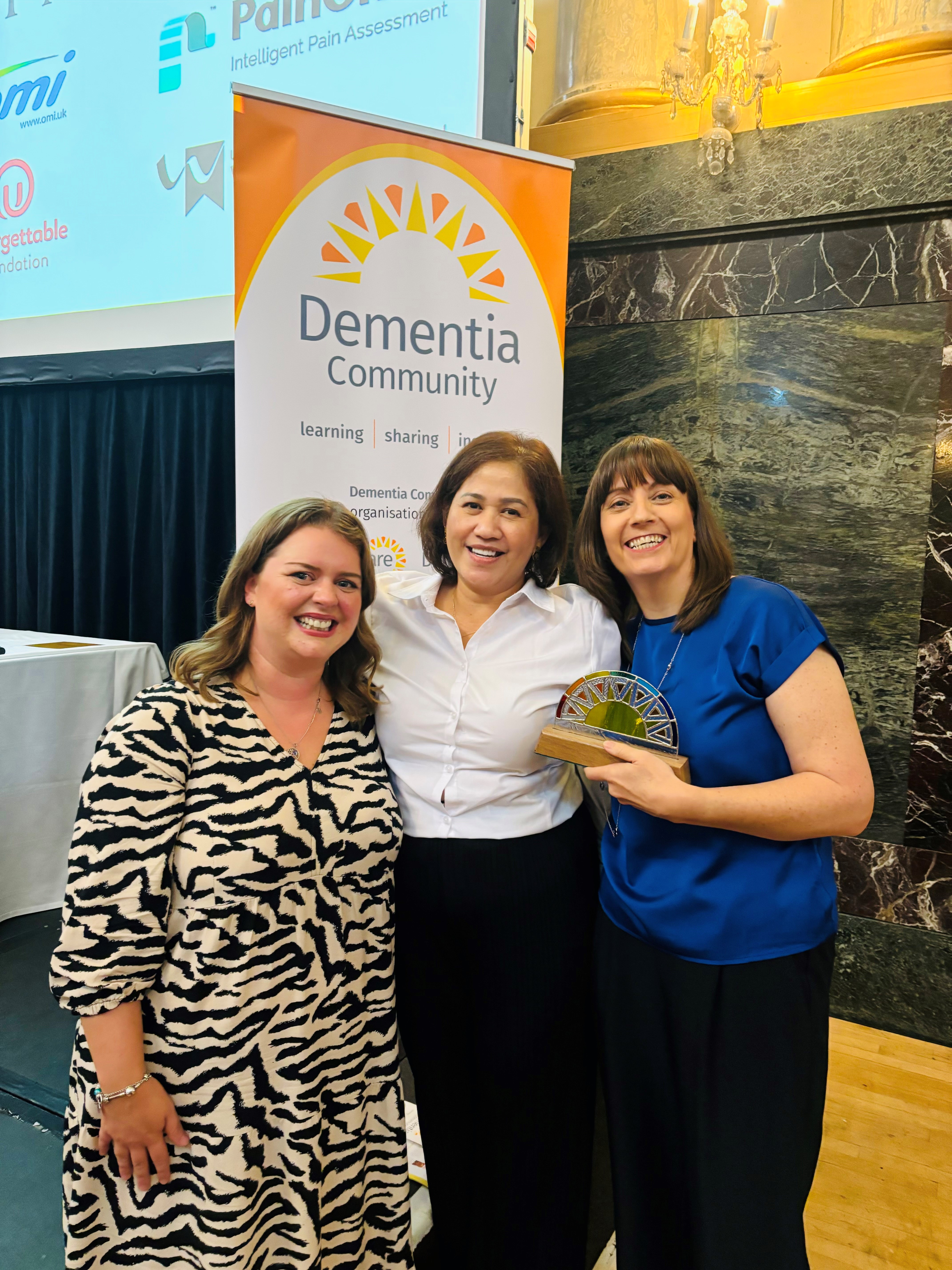 Photo of staff members, Lauren Hanson and Deborah Hammond at the award ceremony
