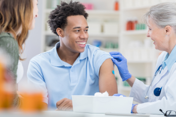 Image of someone having a vaccine. 